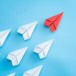 illustration of paper planes following leader
